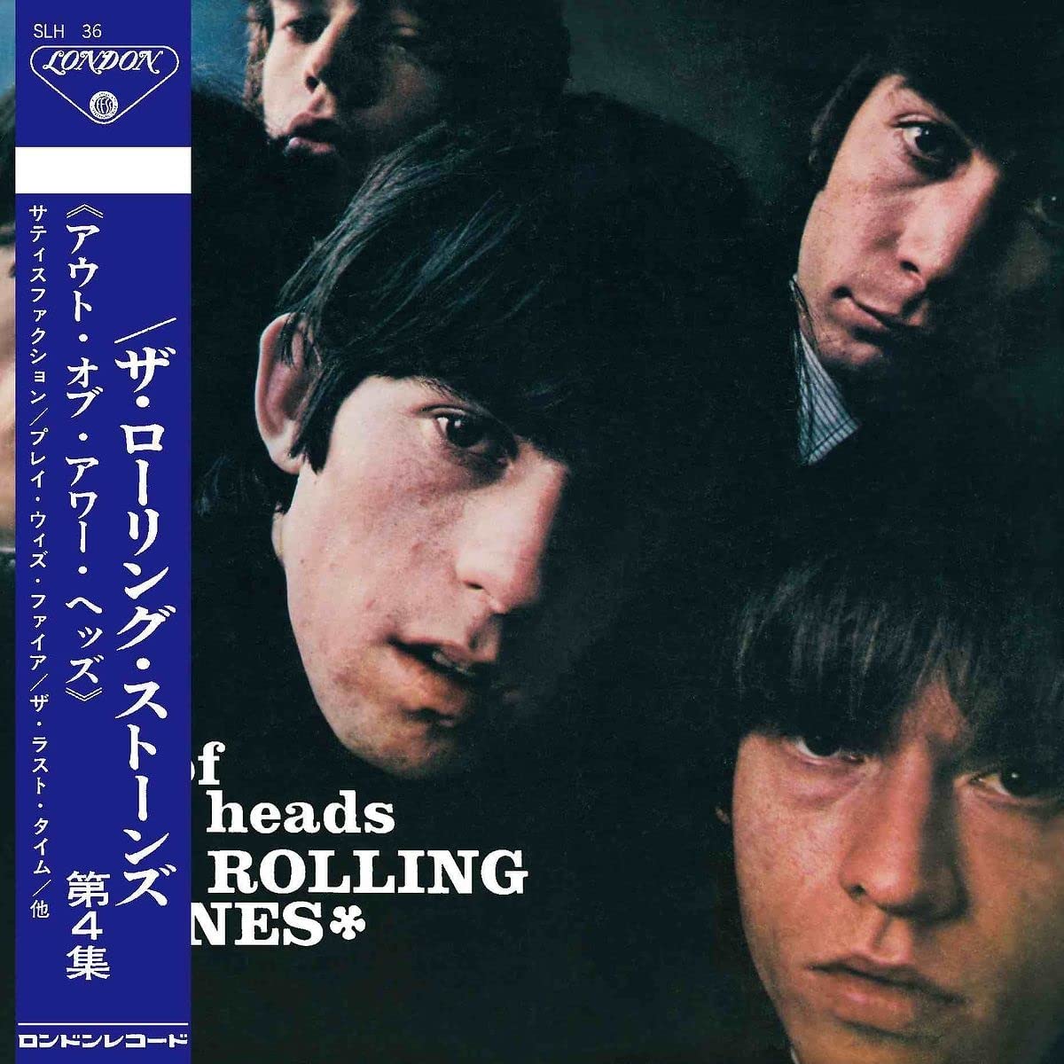 The Rolling Stones album cover featuring close-up faces of band members.