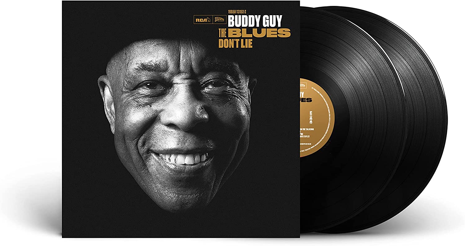 Black and white vinyl album cover featuring a close-up of Buddy Guy's smiling face.