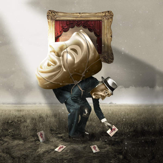 "Man in suit with oversized mask and picture frame head in a field."