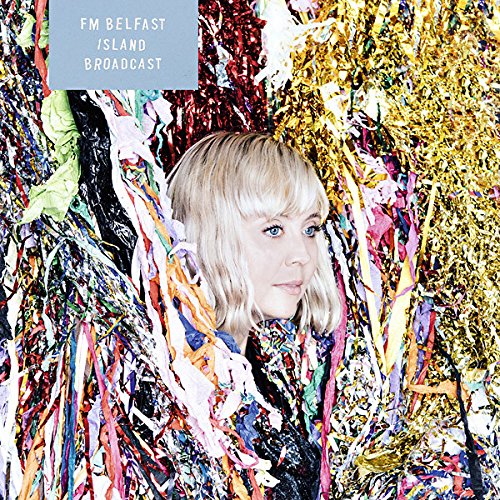 A woman with blonde hair surrounded by colorful, abstract, flowing material, on a music CD cover.