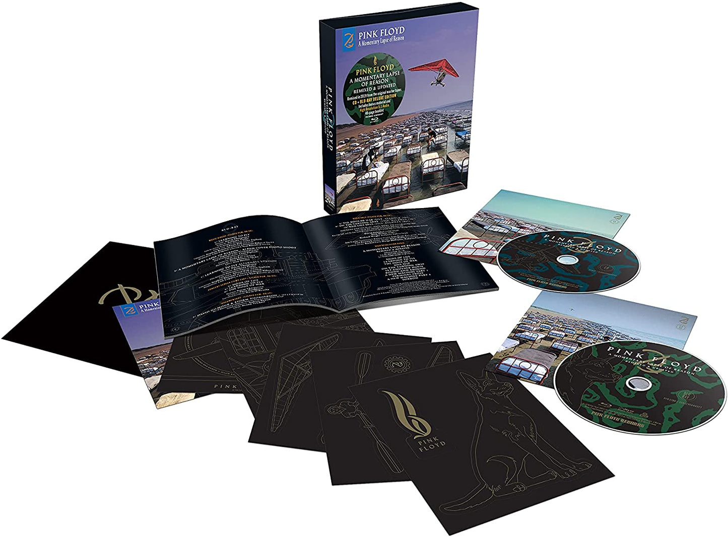 Box set with CDs, booklet, and inserts, featuring a cityscape cover.