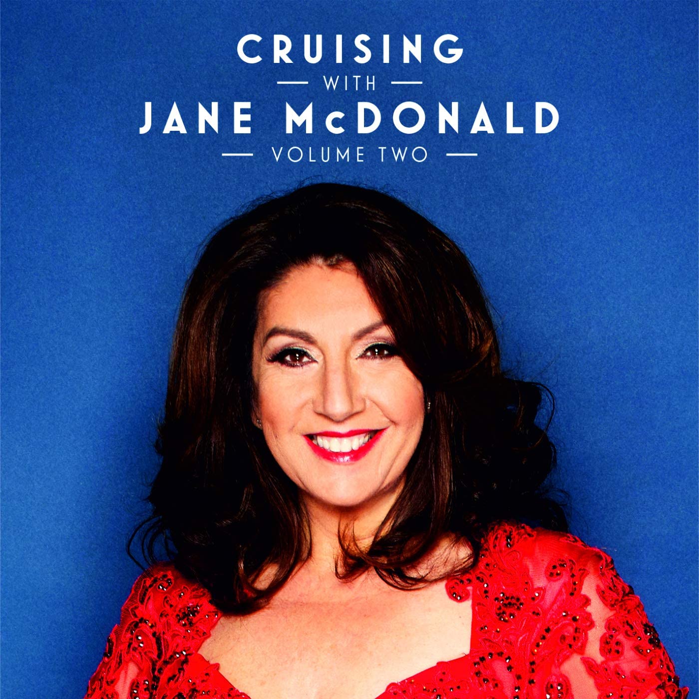 Album cover featuring Jane McDonald smiling, wearing a red dress against a blue background.