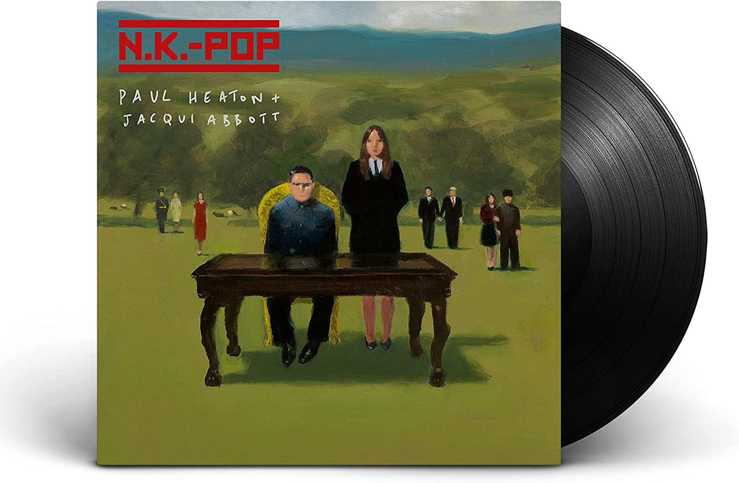 "Vinyl record with cover art featuring a man and woman at a table."