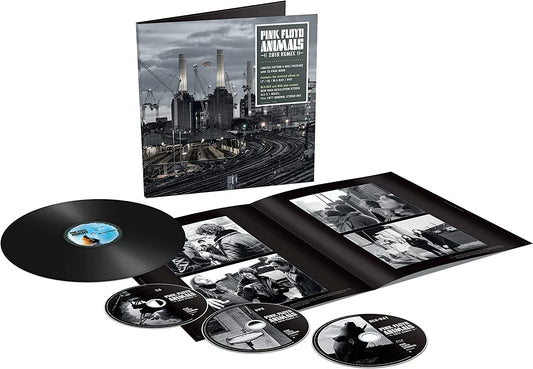 "Pink Floyd's 'Animals' album packaging with vinyl, CDs, and booklet on a white background."