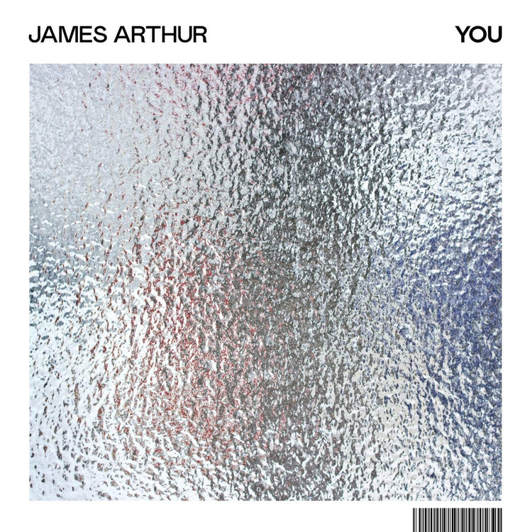 Album cover with textured silver background, artist name, and title, featuring a barcode.