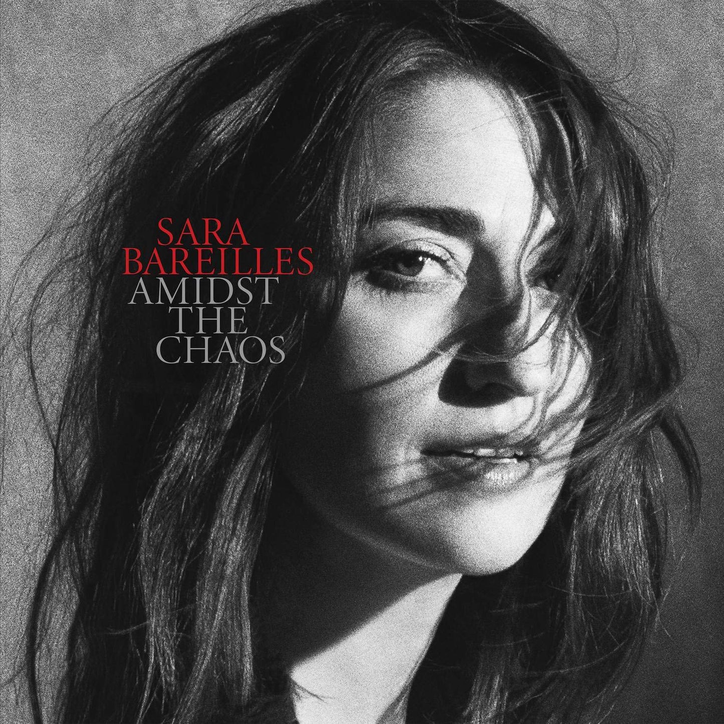 Black and white close-up of Sara Bareilles with text "SARA BAREILLES AMIDST THE CHAOS" on the left.