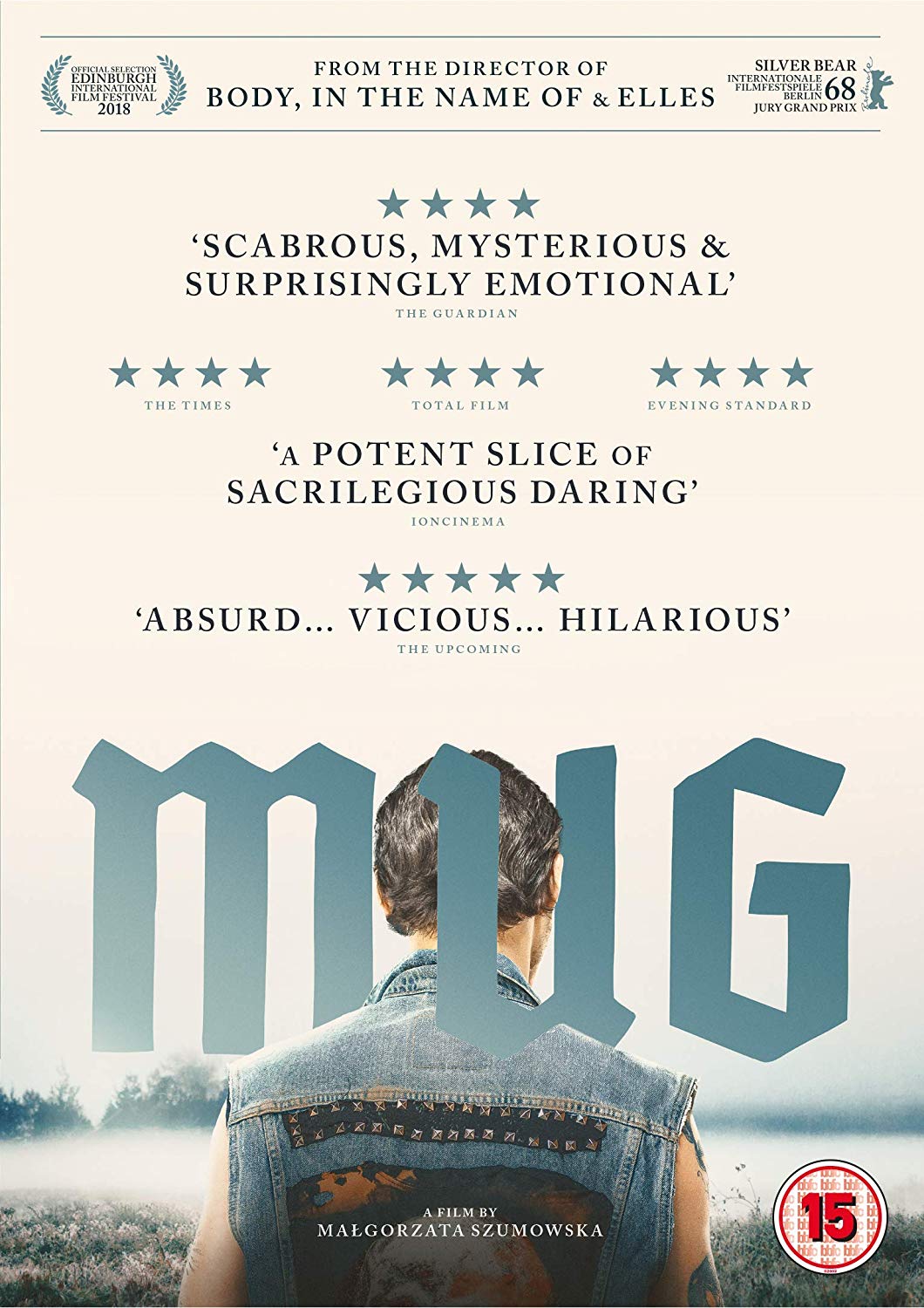 "Mug DVD cover with man in denim vest, facing away, in a field."