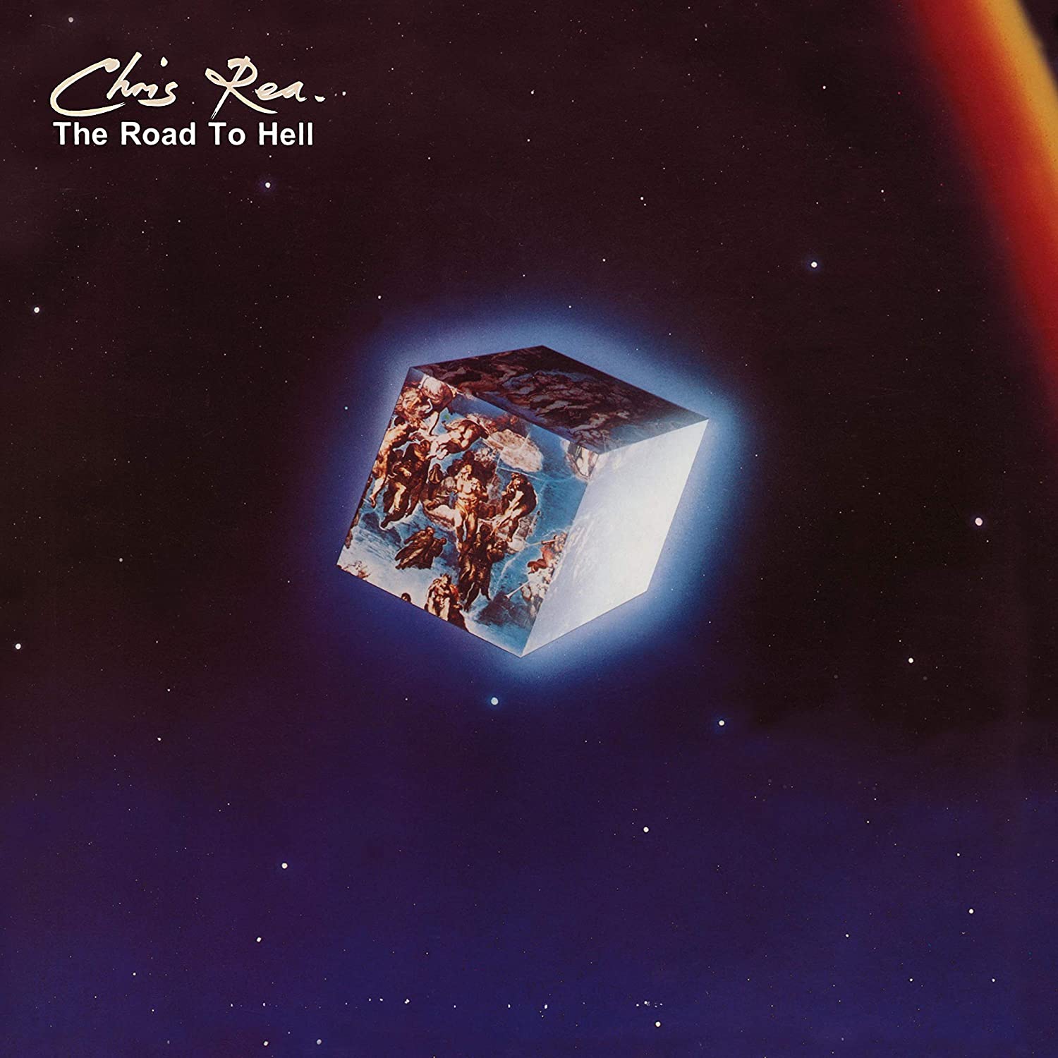 A cube with a desert scene floats in space on a CD album cover.