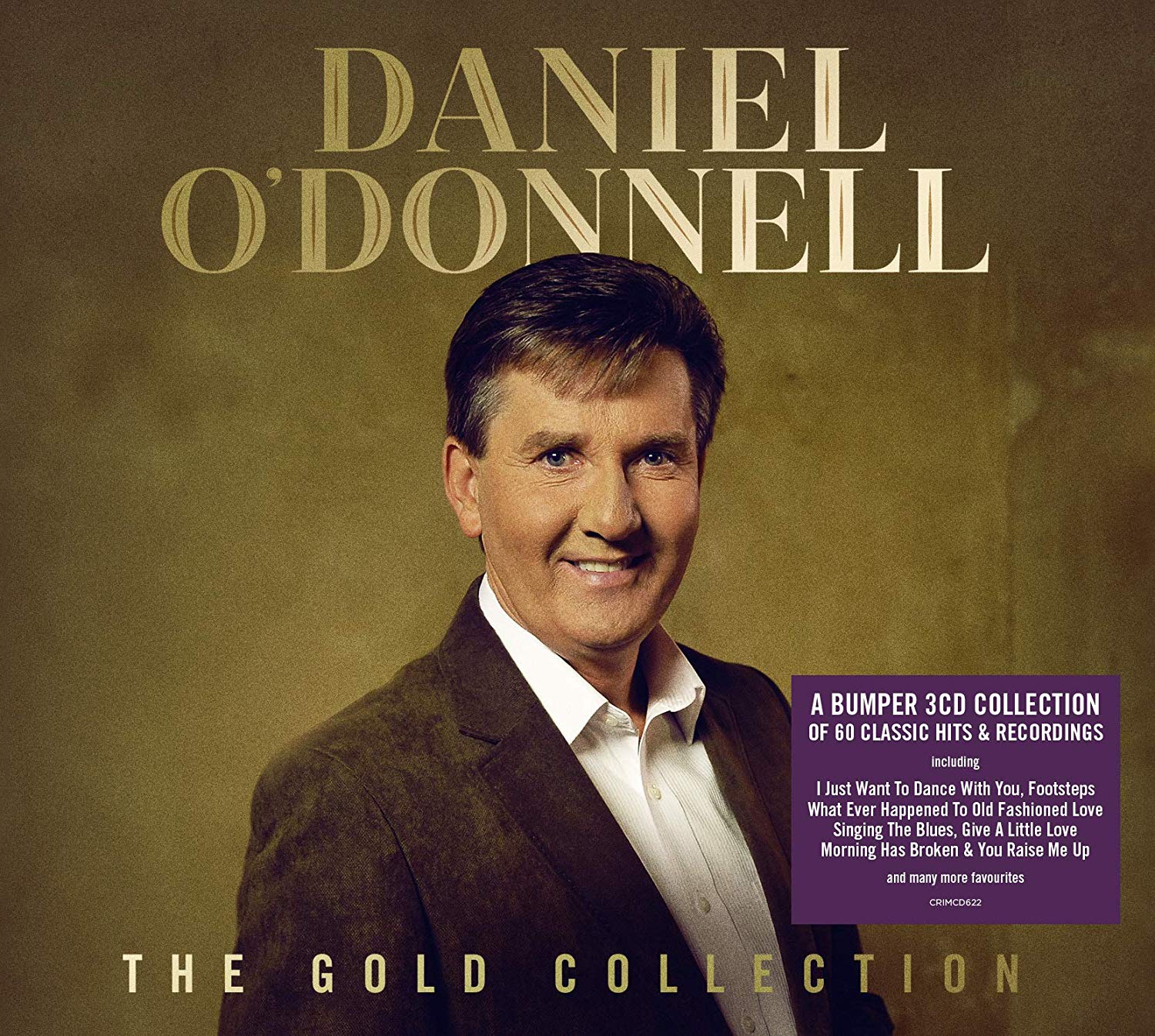 "CD cover featuring Daniel O'Donnell, a man in a brown suit, smiling."
