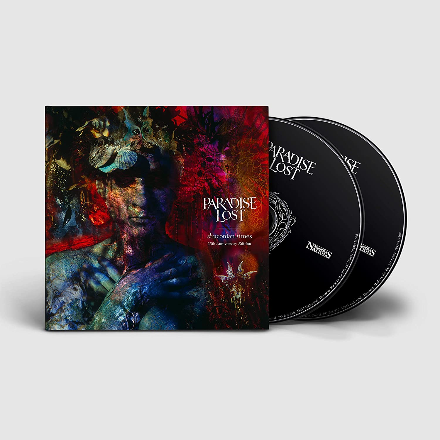 Album cover featuring a surreal, dark figure with a crown-like headpiece.
