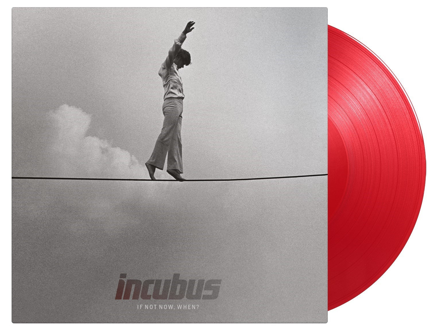 "Red vinyl record with grey album cover featuring a person balancing on a tightrope."