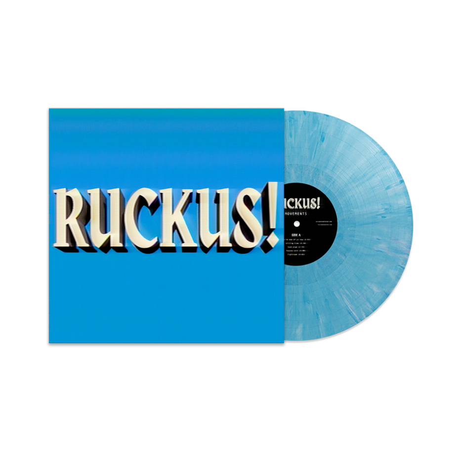 Blue vinyl record with "RUCKUS!" sleeve, partially visible, on a white background.