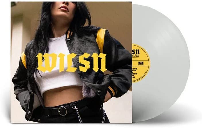 "WILSN vinyl record with clear disc and album cover featuring a woman in a jacket."