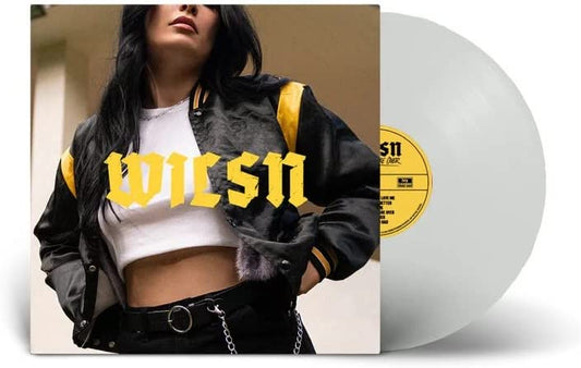 "WILSN vinyl record with clear disc and album cover featuring a woman in a jacket."