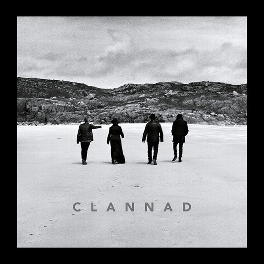 Black and white vinyl album cover featuring four people walking away on a frozen lake.