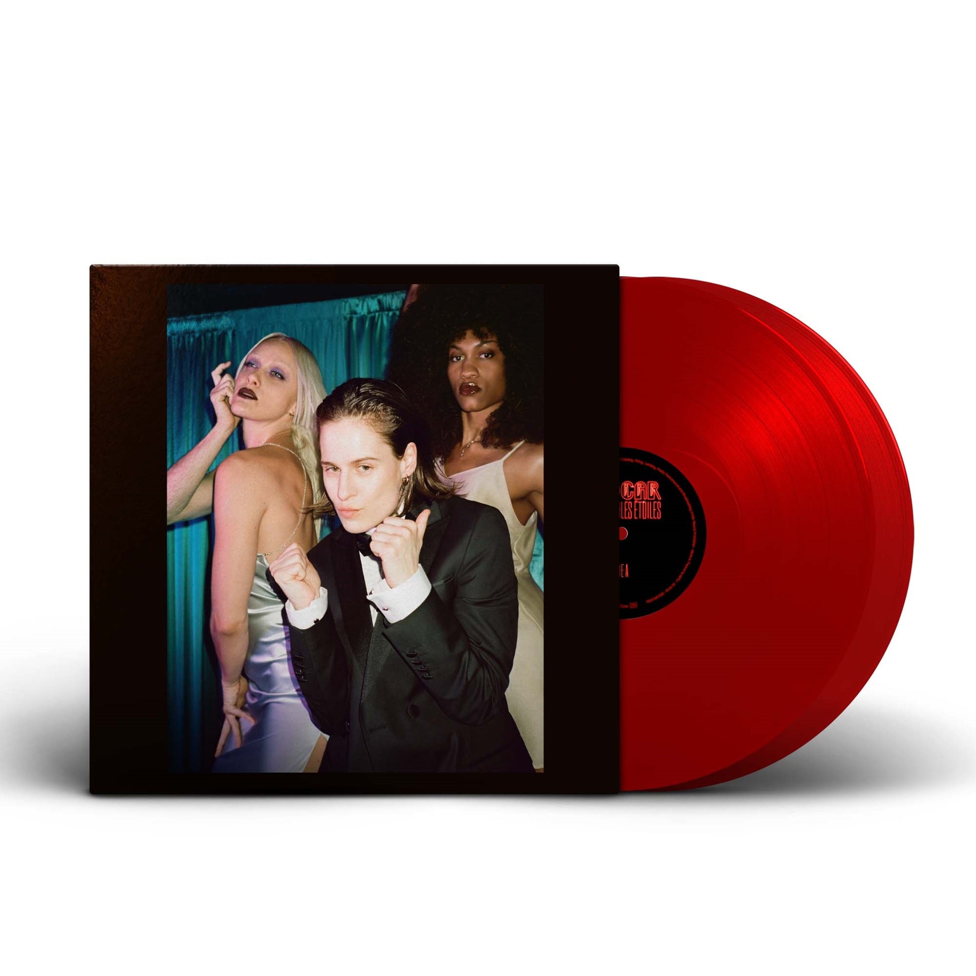 Red vinyl record with album cover featuring three people in formal attire.