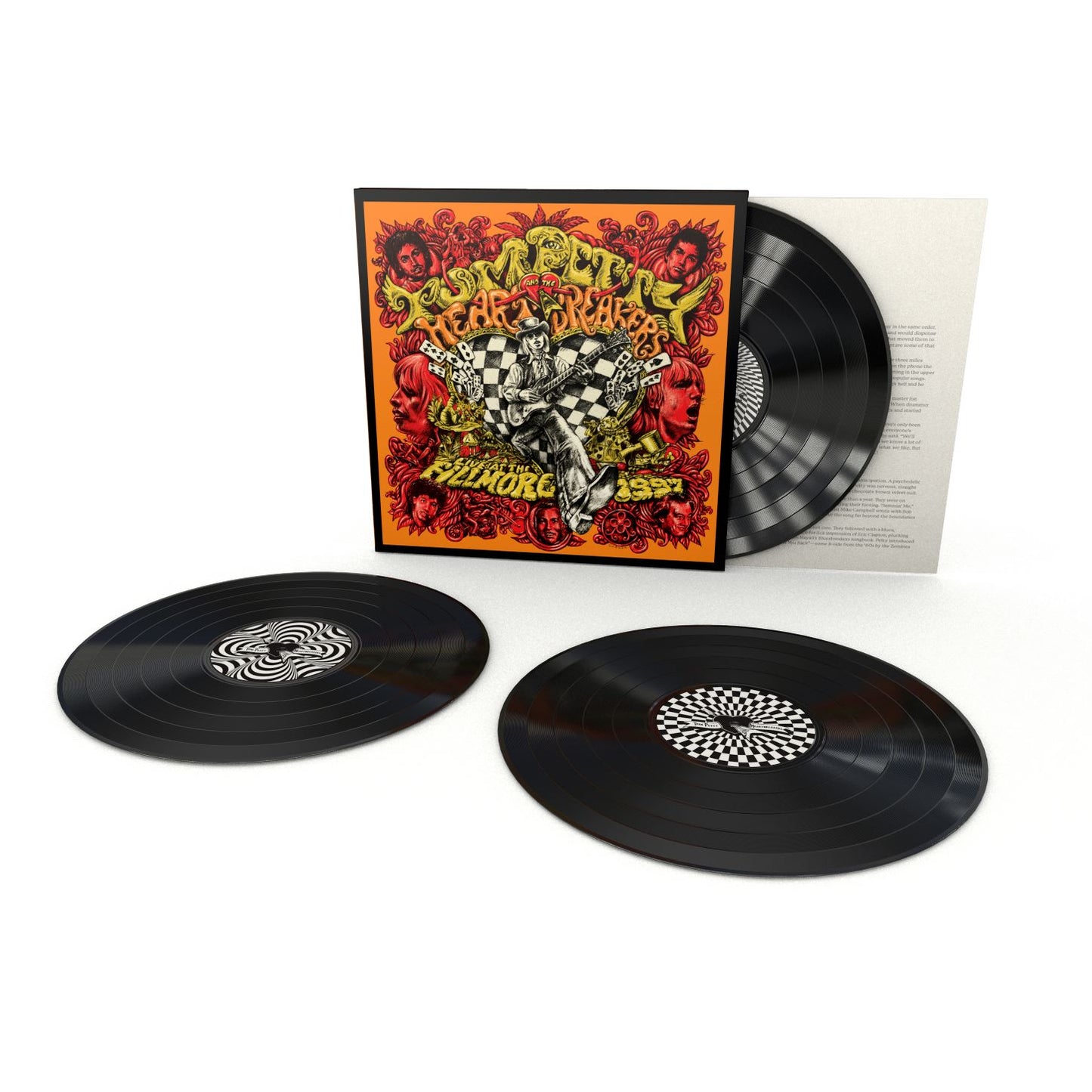 "Three vinyl records with a colorful album cover and white background."