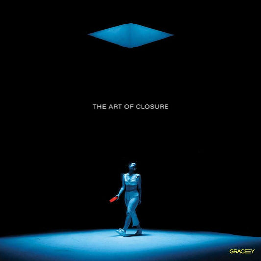 "CD cover featuring a person in a spotlight with a red object, against a dark background."